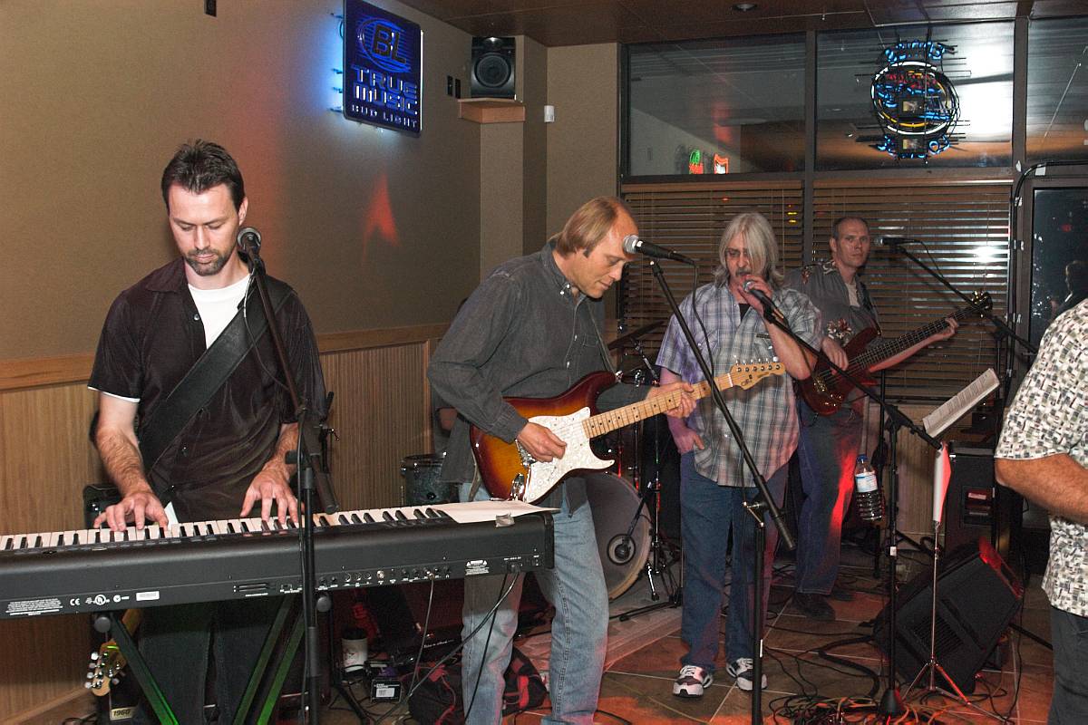 At Eddie's in Lee's Summit. Bill Ray, Me, Frank, Greg Jamison. I'm standing in front of the drummer Ken Ridgeway.